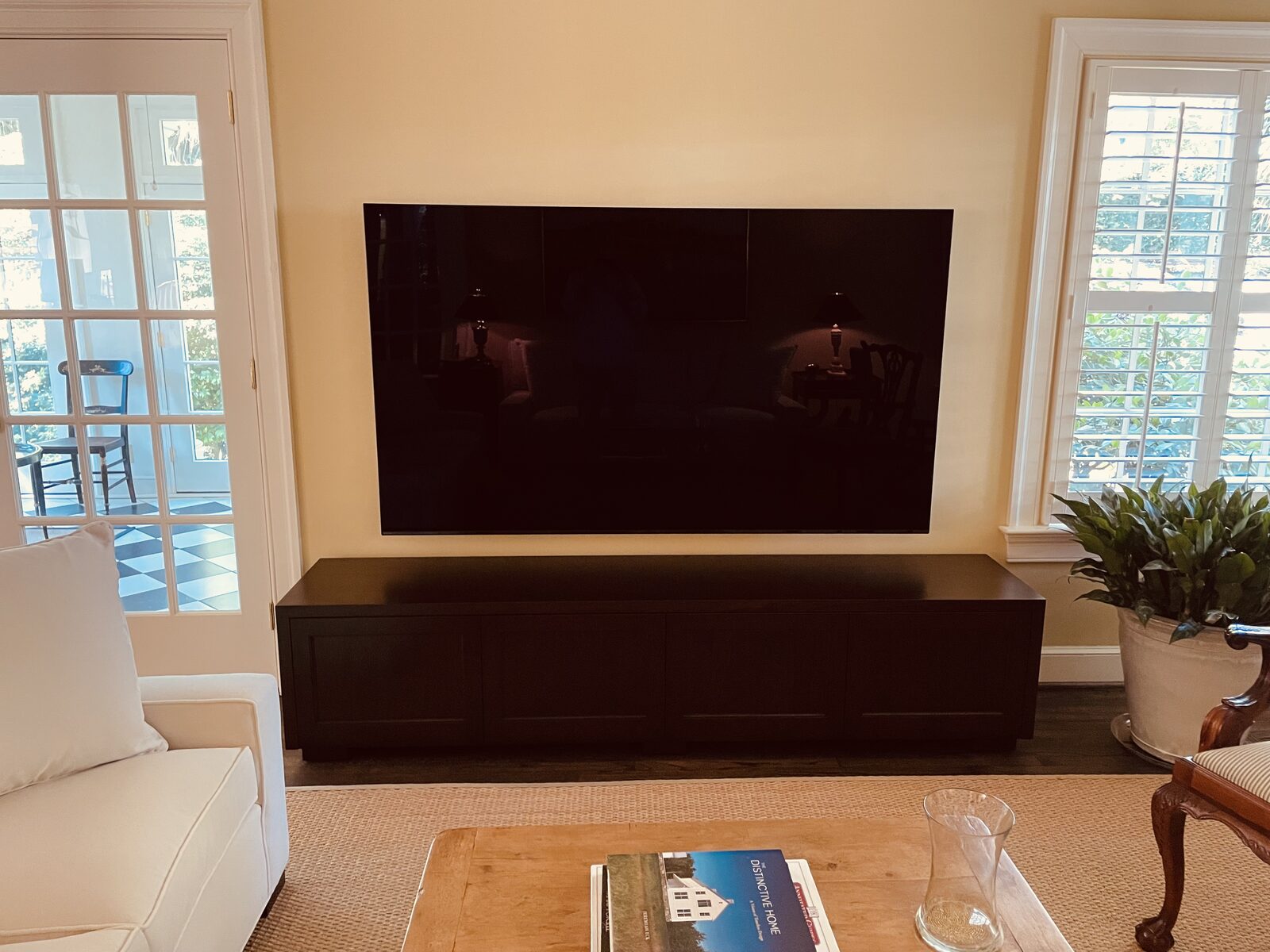 A B&A solid wood media console in a customer's home