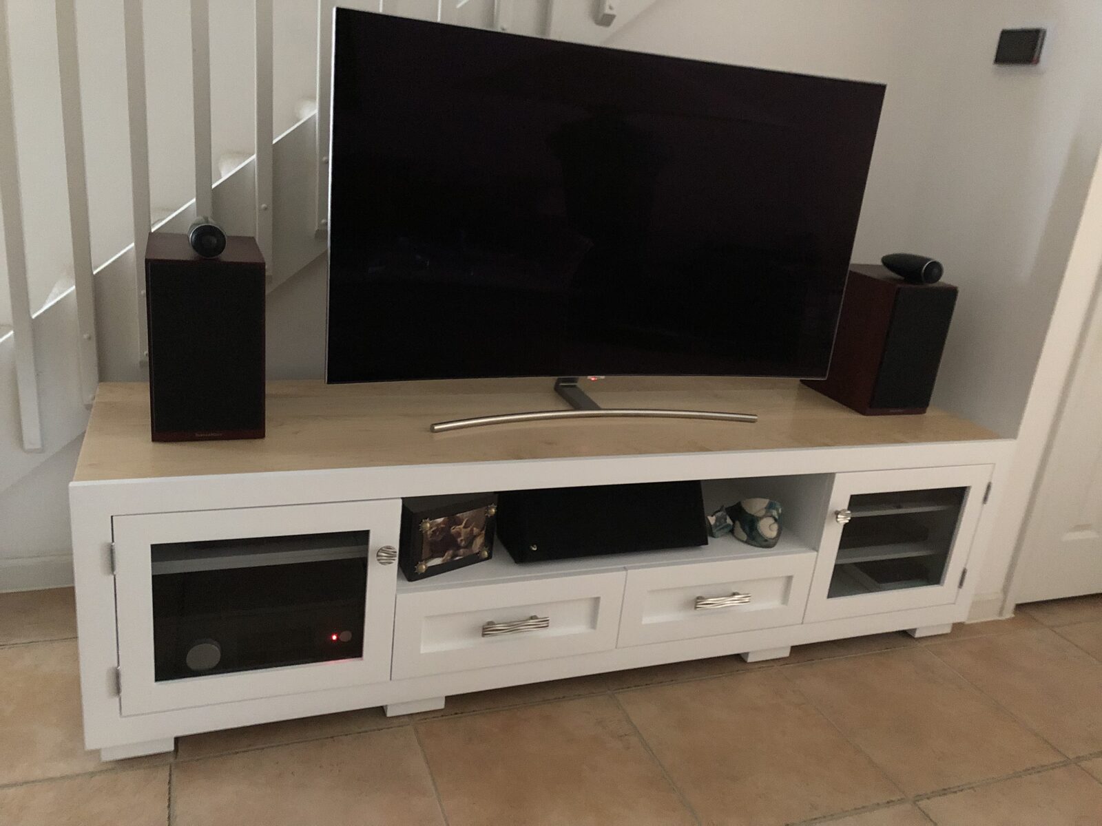 A B&A solid wood media console in a customer's home