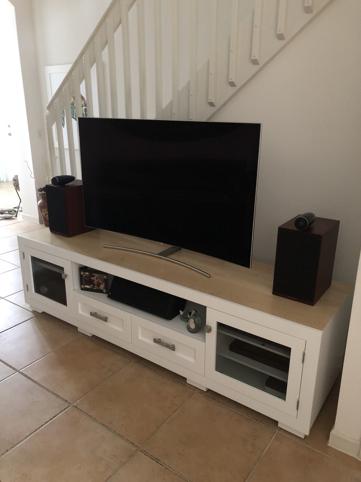 A B&A solid wood media console in a customer's home