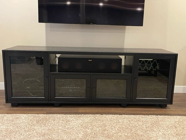 A B&A solid wood media console in a customer's home