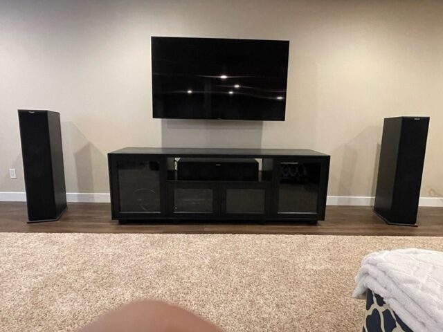 A B&A solid wood media console in a customer's home