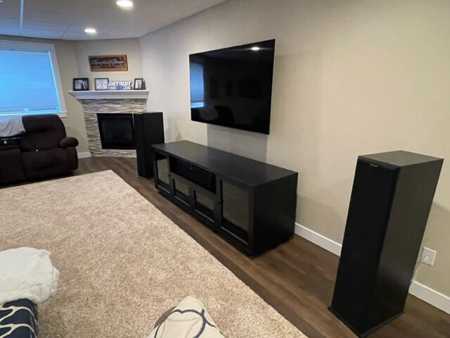 A B&A solid wood media console in a customer's home