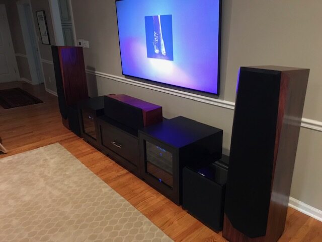 A B&A solid wood media console in a customer's home