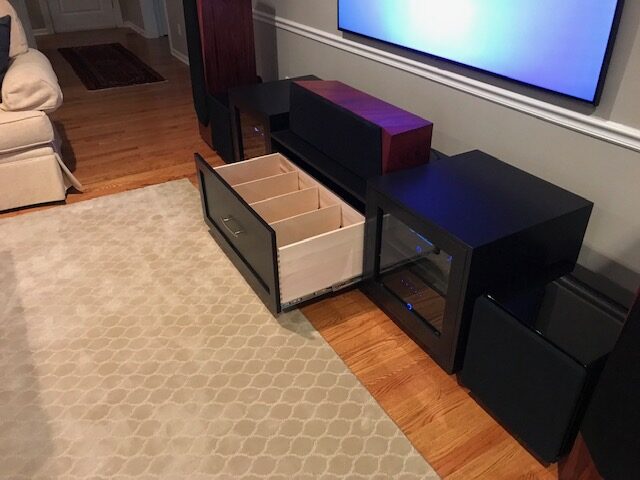 A B&A solid wood media console in a customer's home