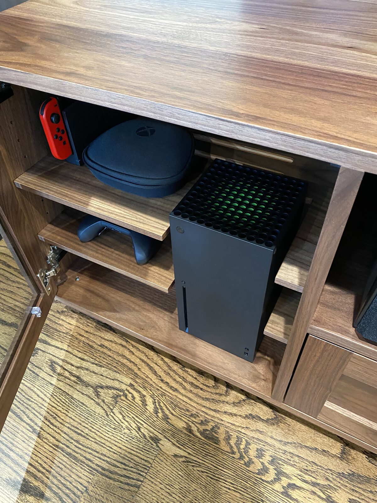 A B&A solid wood media console in a customer's home