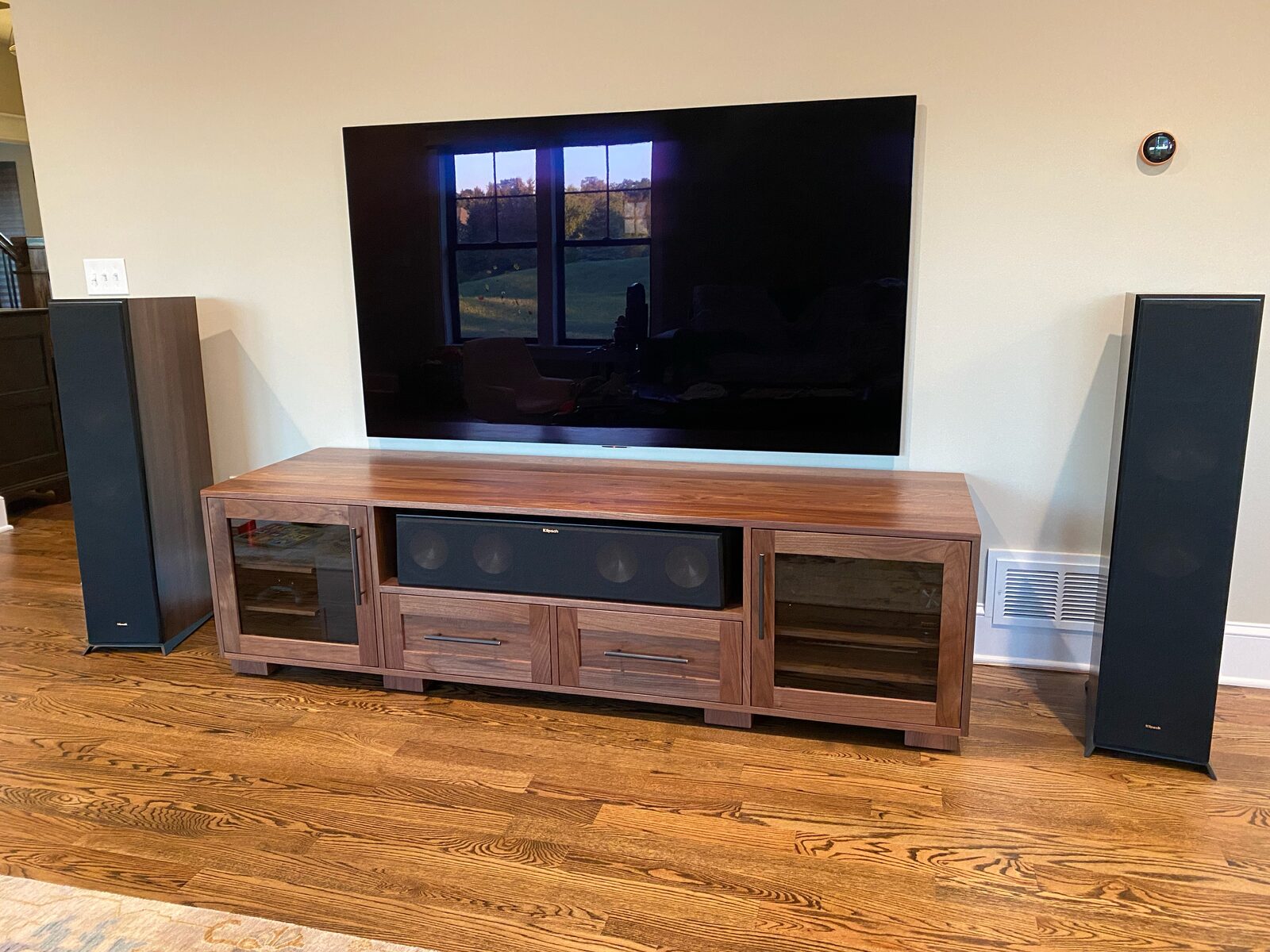 A B&A solid wood media console in a customer's home