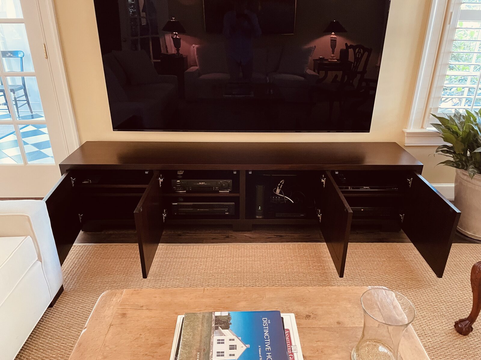 A B&A solid wood media console in a customer's home