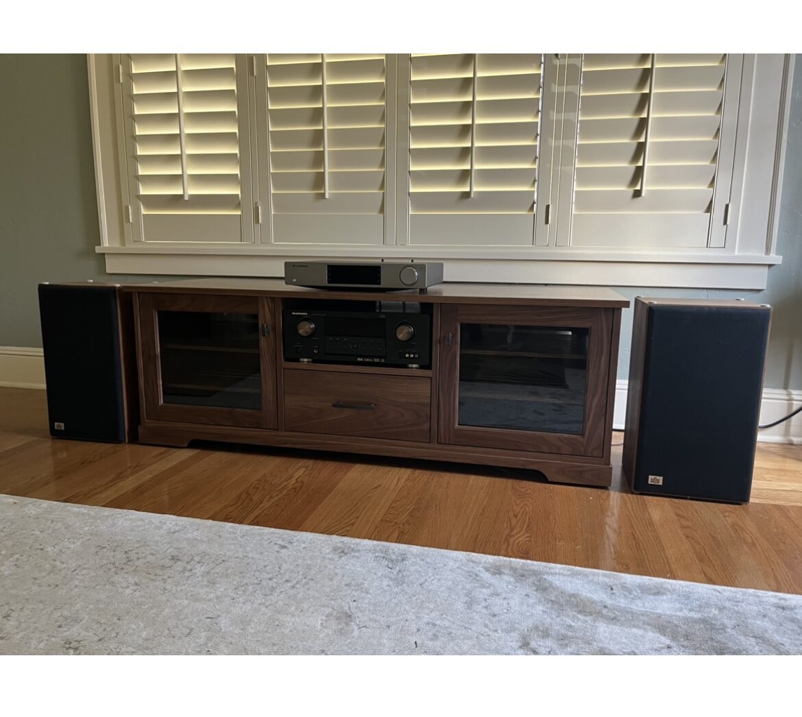 A B&A solid wood media console in a customer's home