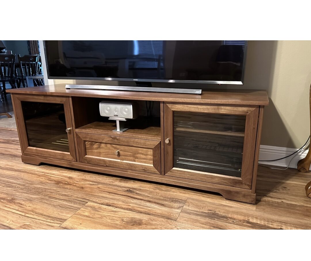 A B&A solid wood media console in a customer's home