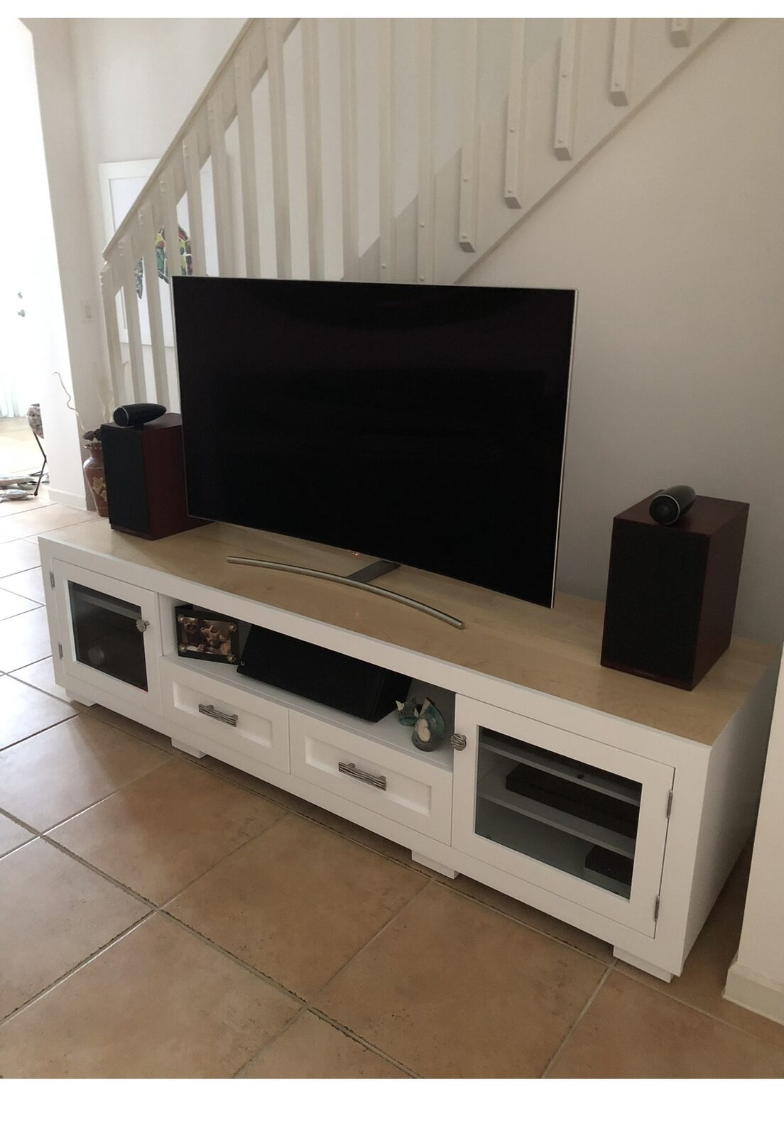 A B&A solid wood media console in a customer's home
