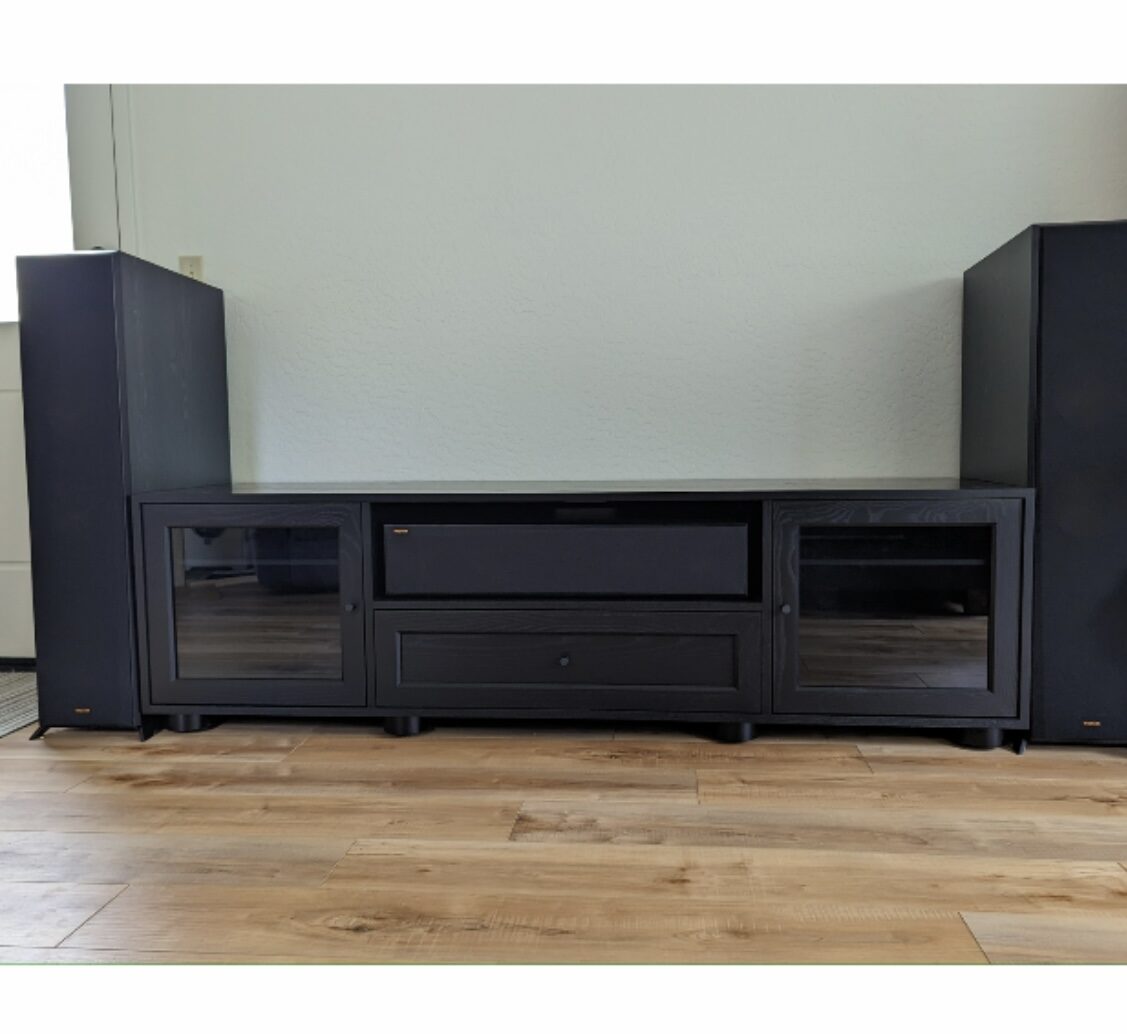 A B&A solid wood media console in a customer's home