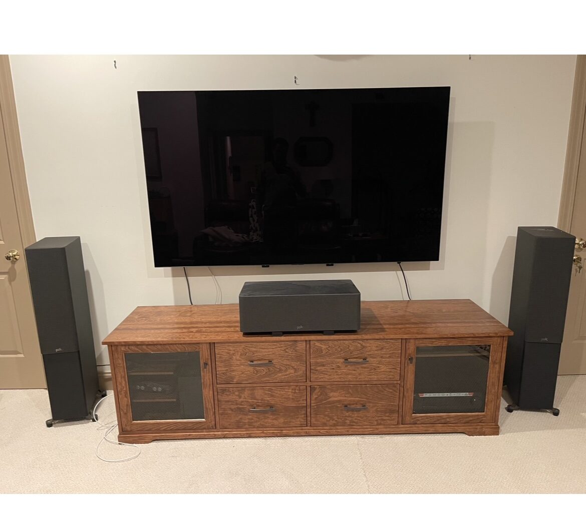 A B&A solid wood media console in a customer's home
