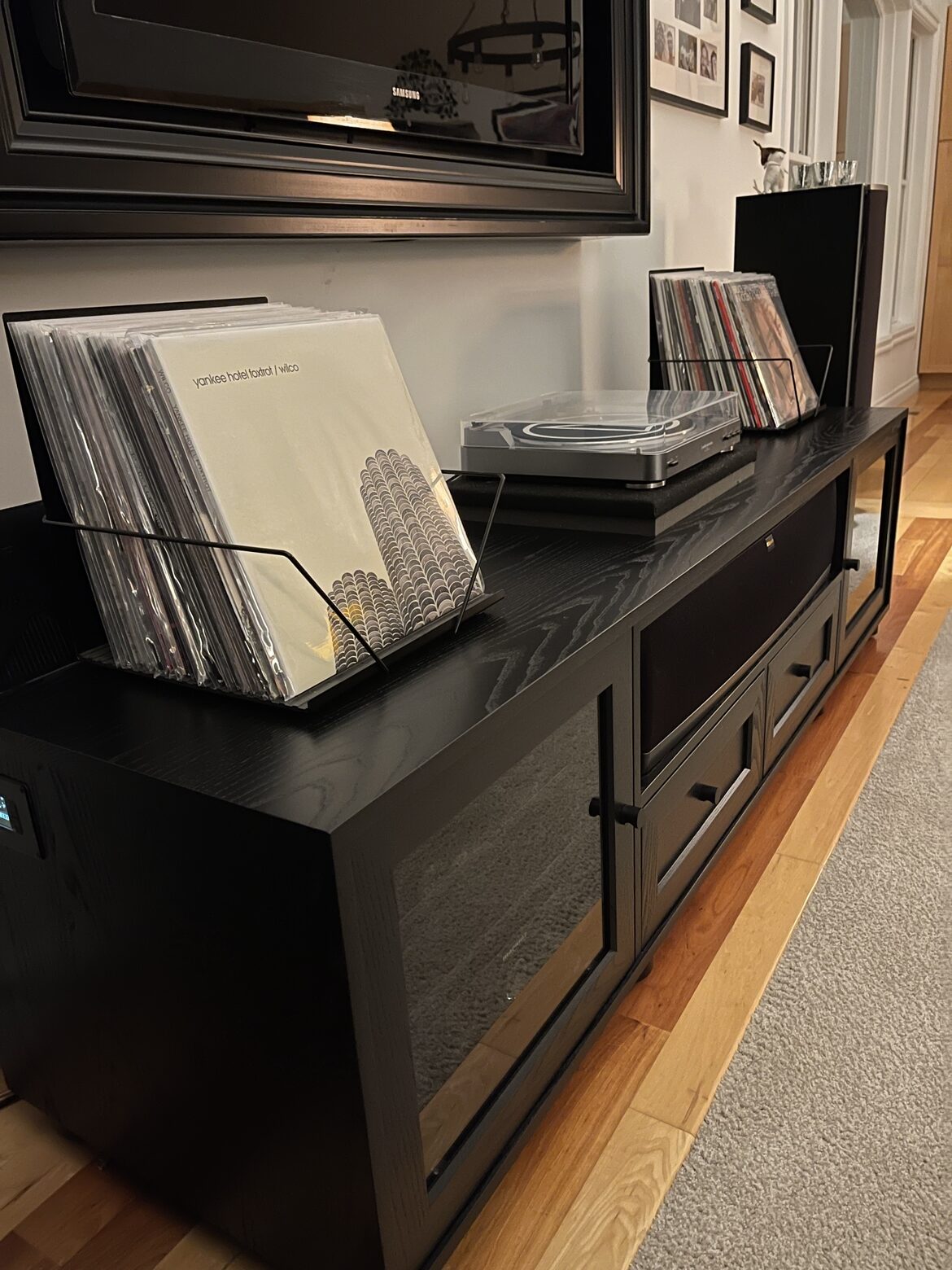 A B&A solid wood media console in a customer's home
