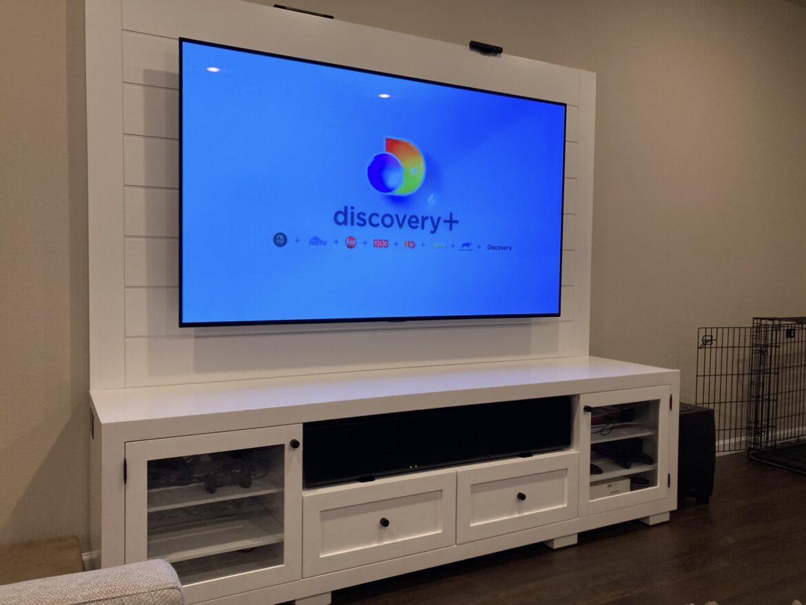 A B&A solid wood media console in a customer's home