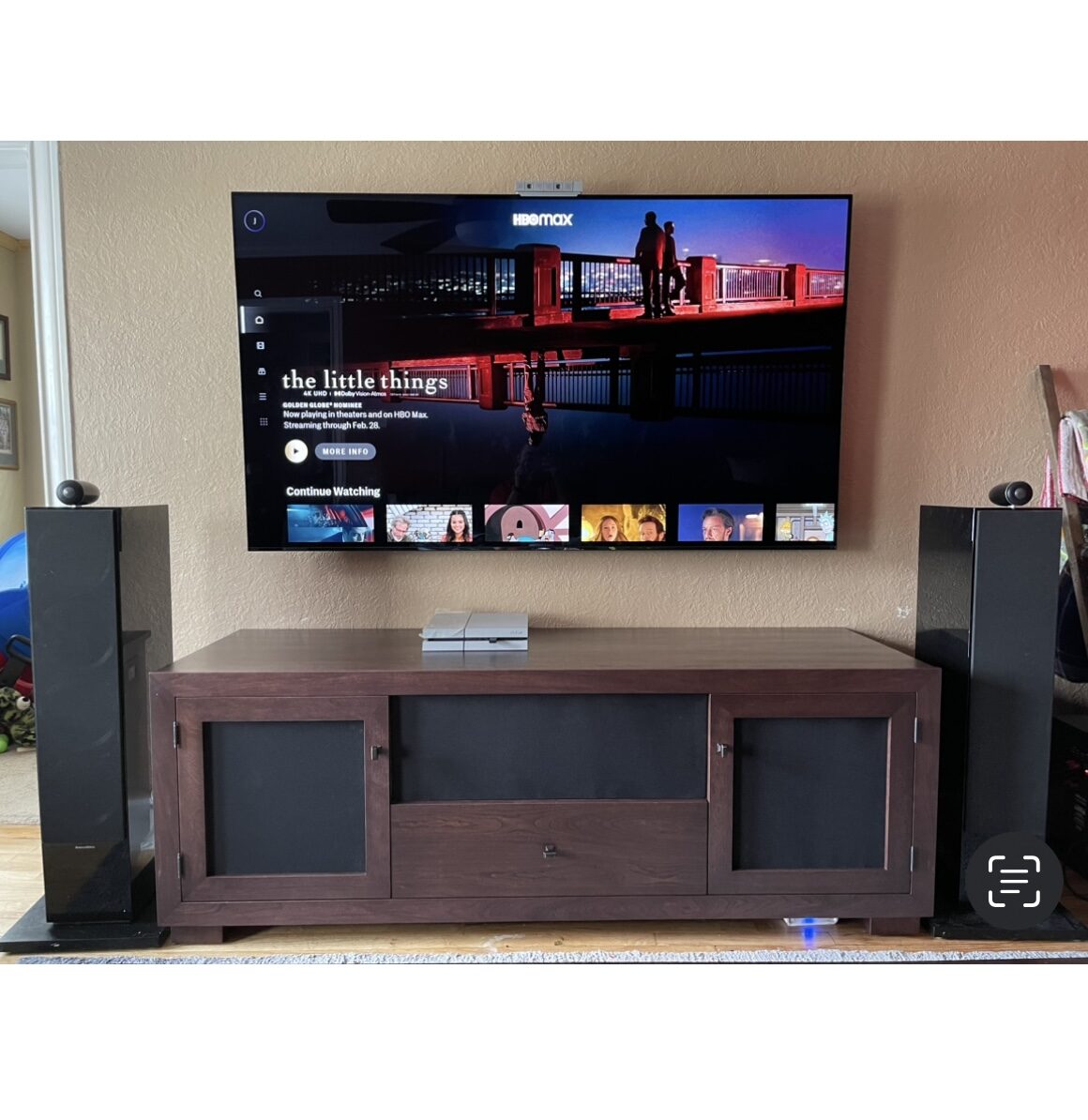 A B&A solid wood media console in a customer's home
