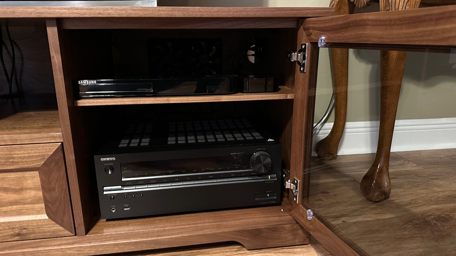 A B&A solid wood media console in a customer's home