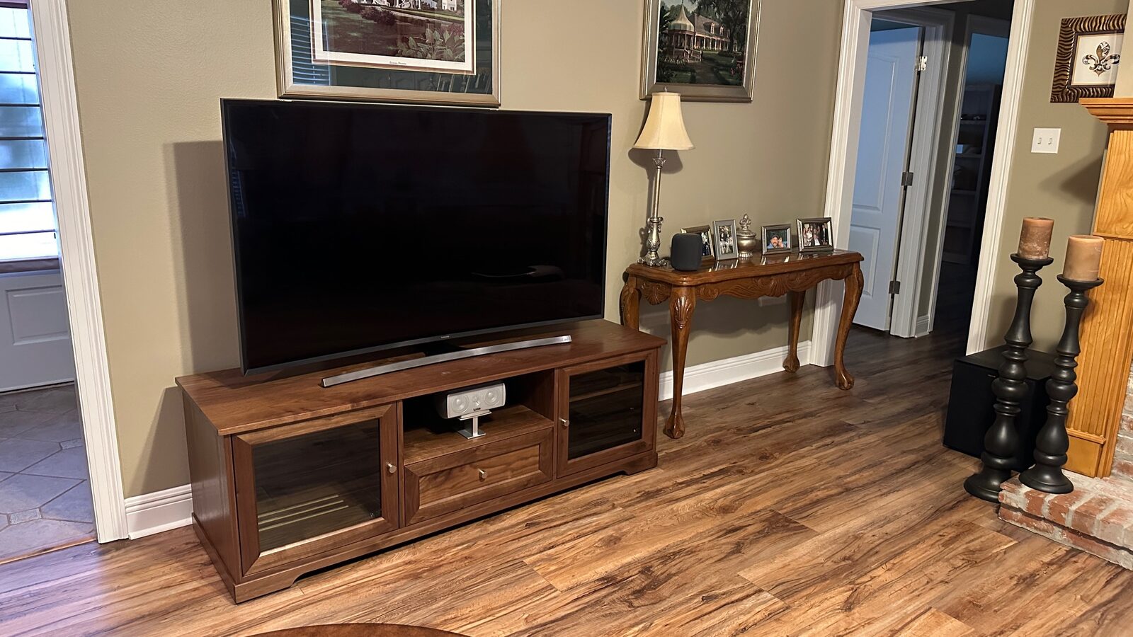 A B&A solid wood media console in a customer's home