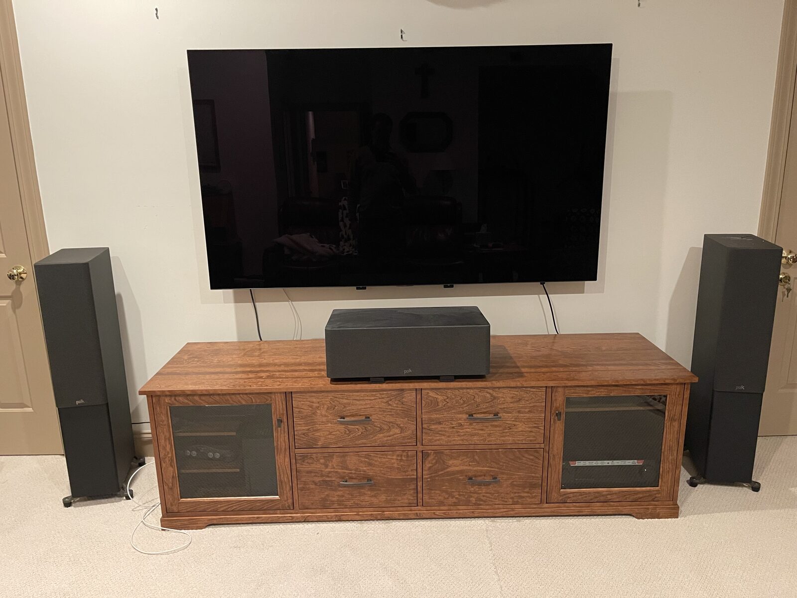 A B&A solid wood media console in a customer's home